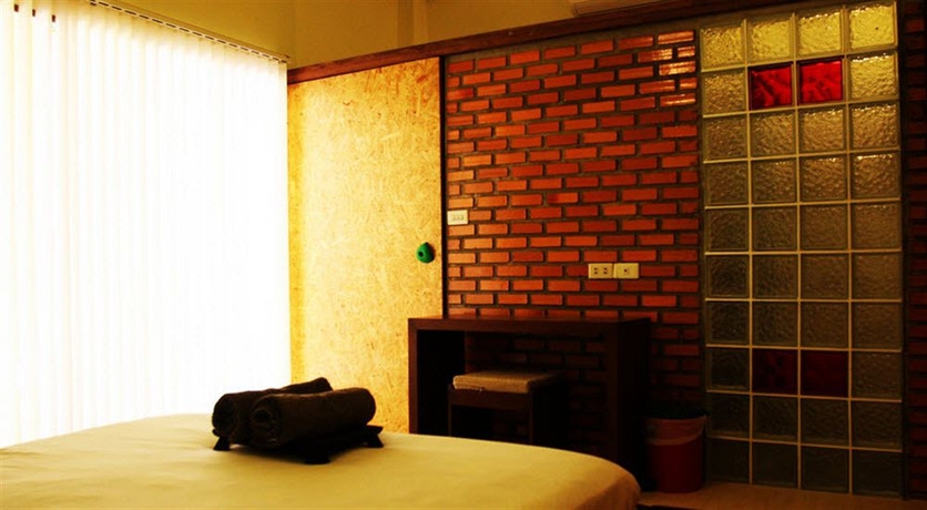 Imagen de la habitación del Hotel Smile House Guesthouse. Foto 2