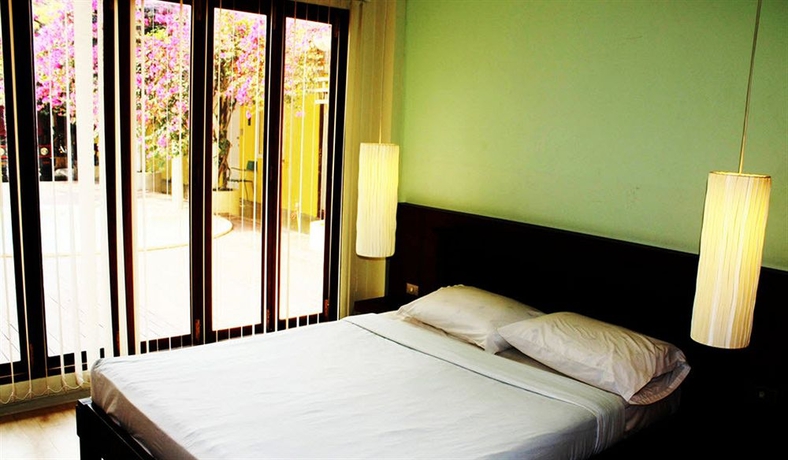 Imagen de la habitación del Hotel Smile House Guesthouse. Foto 3