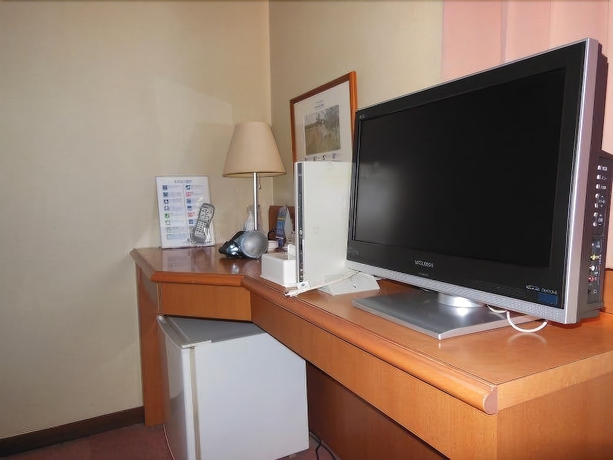 Imagen de la habitación del Hotel Smile Kakegawa. Foto 6