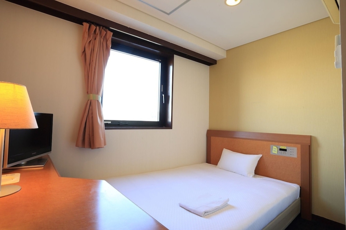 Imagen de la habitación del Hotel Smile Kakegawa. Foto 7