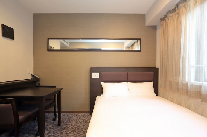 Imagen de la habitación del Hotel Smile Kawaguchi. Foto 11