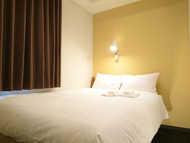 Imagen de la habitación del Hotel Smile Kobe Motomachi. Foto 3