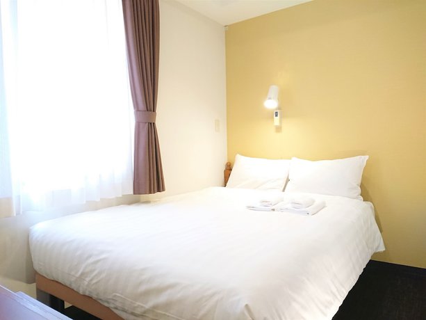 Imagen de la habitación del Hotel Smile Kobe Motomachi. Foto 4