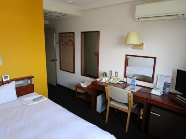 Imagen de la habitación del Hotel Smile Koriyama. Foto 7