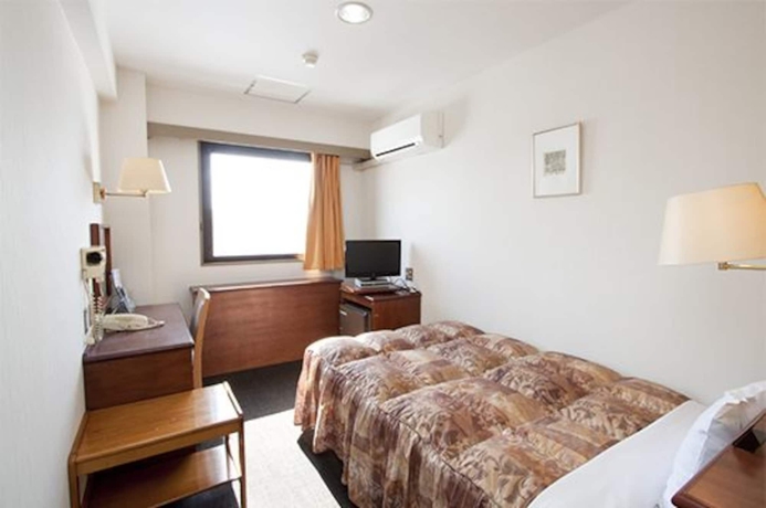 Imagen de la habitación del Hotel Smile Koriyama. Foto 8