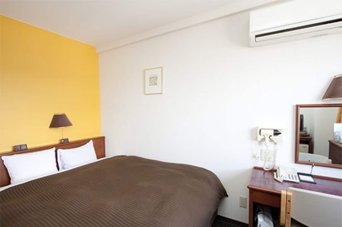 Imagen de la habitación del Hotel Smile Koriyama. Foto 10