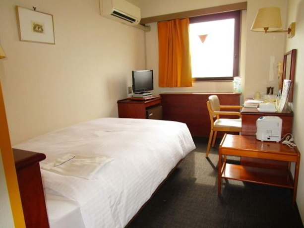 Imagen de la habitación del Hotel Smile Koriyama. Foto 11