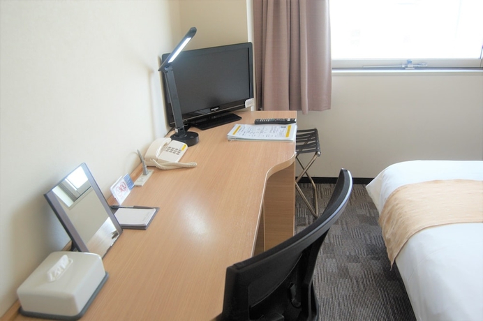 Imagen de la habitación del Hotel Smile Kumagaya. Foto 4