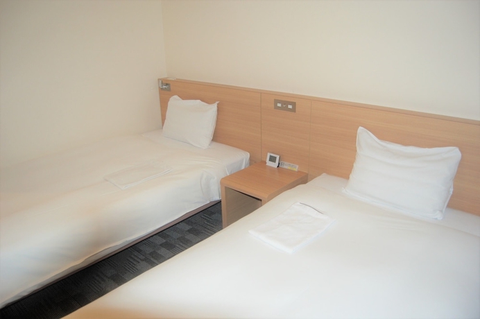 Imagen de la habitación del Hotel Smile Kumagaya. Foto 8