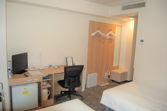 Imagen de la habitación del Hotel Smile Kumagaya. Foto 9