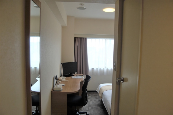 Imagen de la habitación del Hotel Smile Kumagaya. Foto 15