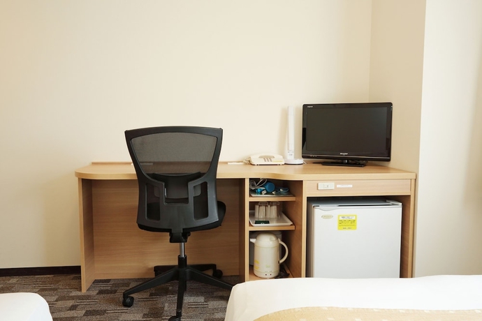 Imagen de la habitación del Hotel Smile Kumagaya. Foto 18