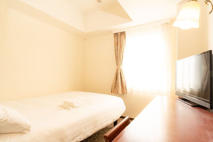 Imagen de la habitación del Hotel Smile Nishiakashi. Foto 7