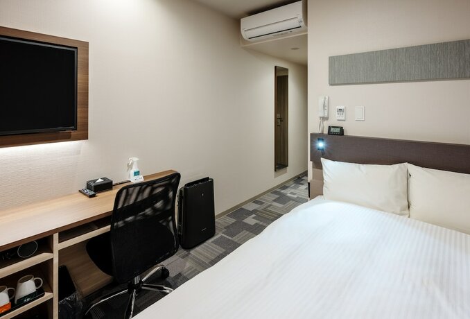 Imagen de la habitación del Hotel Smile Okayama. Foto 13