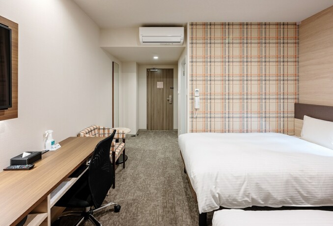 Imagen de la habitación del Hotel Smile Okayama. Foto 15