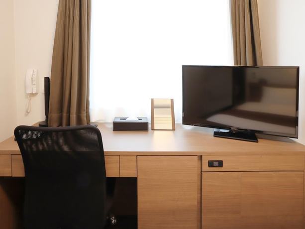 Imagen de la habitación del Hotel Smile Premium Sapporosusukino. Foto 11