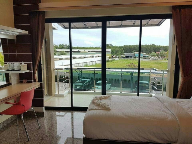 Imagen de la habitación del Hotel Smile Resort Thungsong. Foto 5