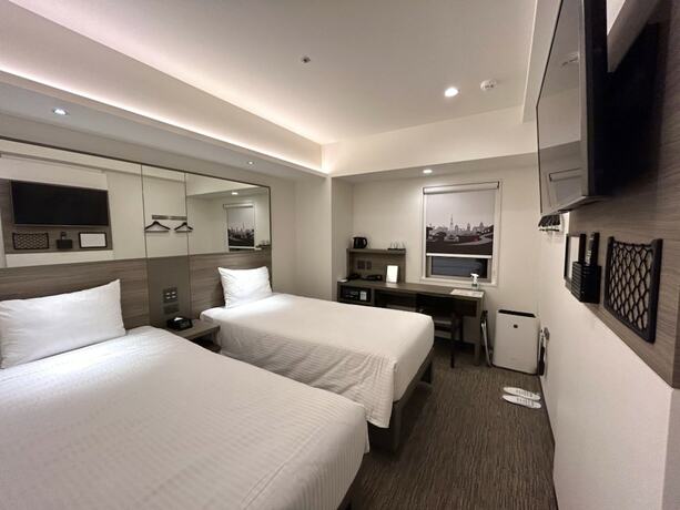 Imagen de la habitación del Hotel Smile Sapporo Susukino Minami. Foto 13