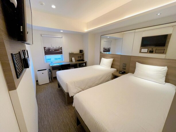 Imagen de la habitación del Hotel Smile Sapporo Susukino Minami. Foto 17