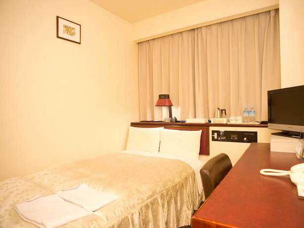 Imagen de la habitación del Hotel Smile Sasebo. Foto 11