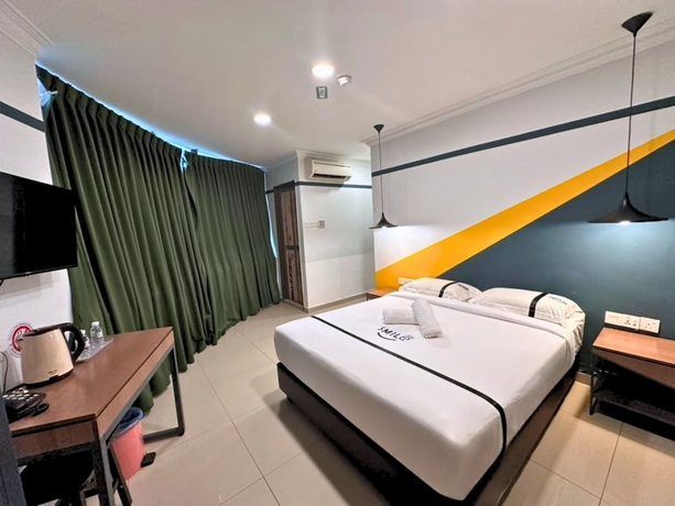 Imagen de la habitación del Hotel Smile Serdang South City. Foto 4