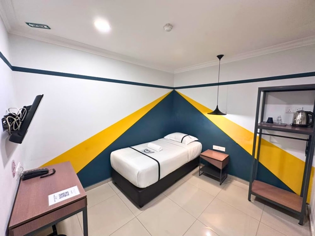 Imagen de la habitación del Hotel Smile Serdang South City. Foto 6