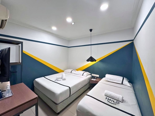 Imagen de la habitación del Hotel Smile Serdang South City. Foto 8