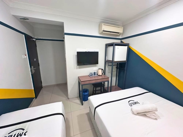 Imagen de la habitación del Hotel Smile Serdang South City. Foto 9