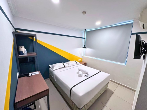 Imagen de la habitación del Hotel Smile Serdang South City. Foto 10