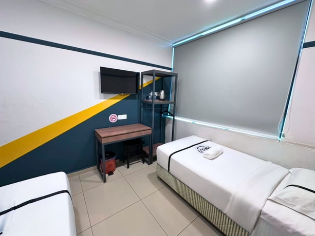 Imagen de la habitación del Hotel Smile Serdang South City. Foto 12
