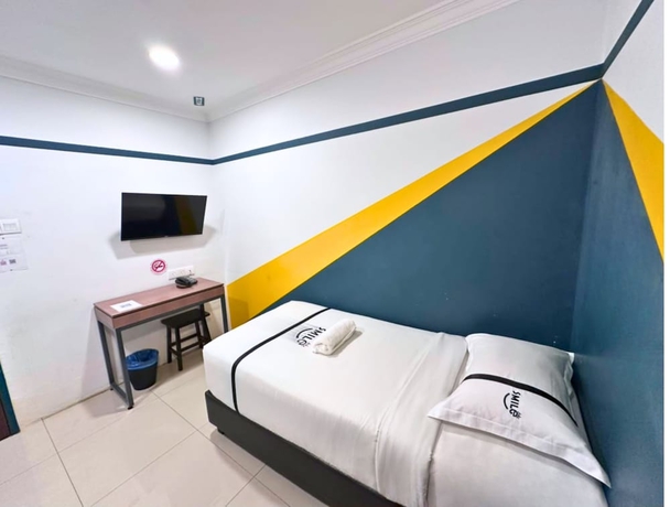 Imagen de la habitación del Hotel Smile Serdang South City. Foto 13