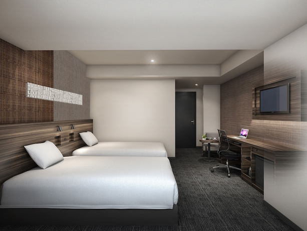 Imagen de la habitación del Hotel Smile Shinosaka. Foto 5