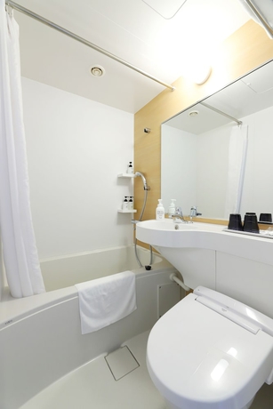 Imagen de la habitación del Hotel Smile Shinosaka. Foto 11