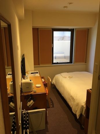 Imagen de la habitación del Hotel Smile Sugamo. Foto 9