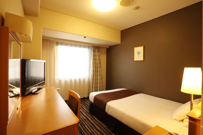 Imagen de la habitación del Hotel Smile Tokushima. Foto 5