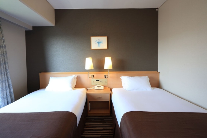 Imagen de la habitación del Hotel Smile Tokushima. Foto 8