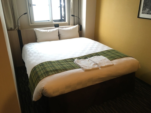Imagen de la habitación del Hotel Smile Tokyo Asagaya. Foto 3