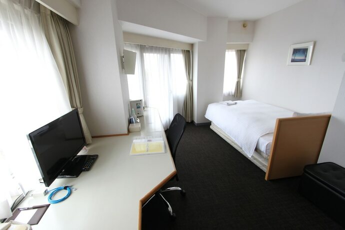 Imagen de la habitación del Hotel Smile Tokyo Tamanagayama. Foto 17