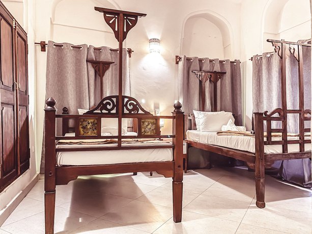 Imagen de la habitación del Hotel Smiles Stone Town. Foto 4