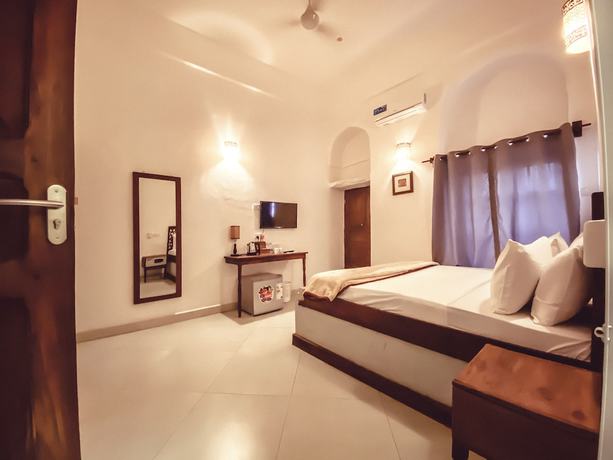 Imagen de la habitación del Hotel Smiles Stone Town. Foto 6