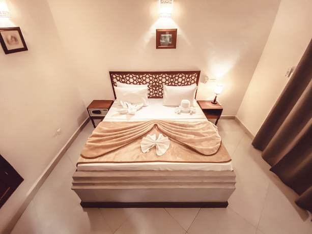 Imagen de la habitación del Hotel Smiles Stone Town. Foto 9