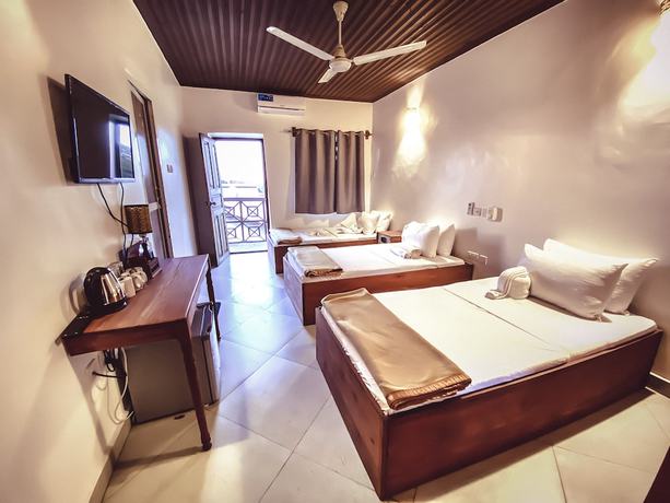 Imagen de la habitación del Hotel Smiles Stone Town. Foto 10