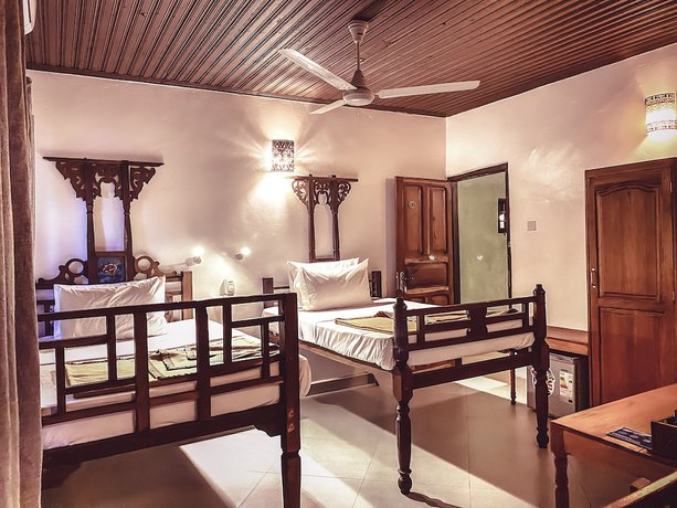 Imagen de la habitación del Hotel Smiles Stone Town. Foto 11