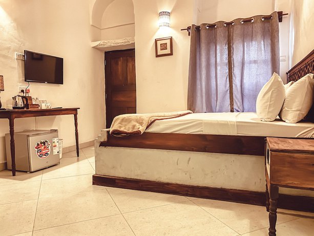 Imagen de la habitación del Hotel Smiles Stone Town. Foto 14