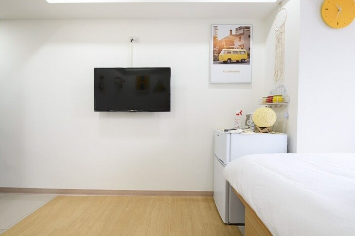 Imagen de la habitación del Hotel Smiling Taipei. Foto 24