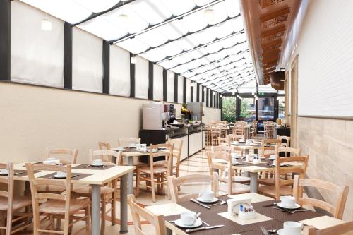 Imagen del bar/restaurante del Hotel Smooth Rome West. Foto 3