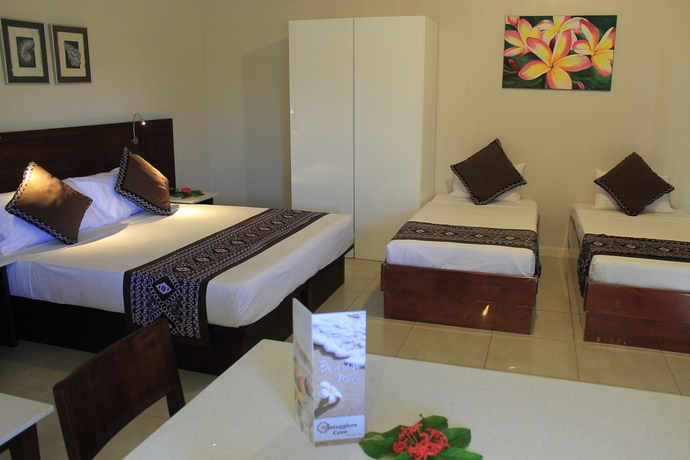 Imagen de la habitación del Hotel Smugglers Cove Beach Resort and. Foto 9