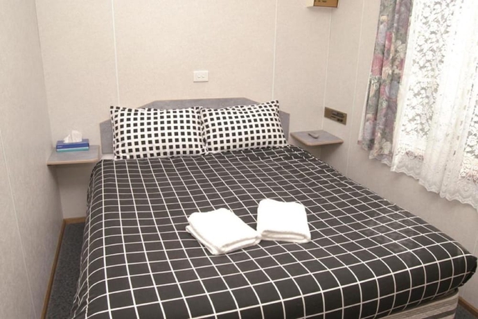 Imagen de la habitación del Hotel Smugglers Cove Holiday Village. Foto 5