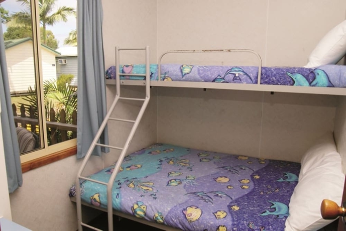 Imagen de la habitación del Hotel Smugglers Cove Holiday Village. Foto 17