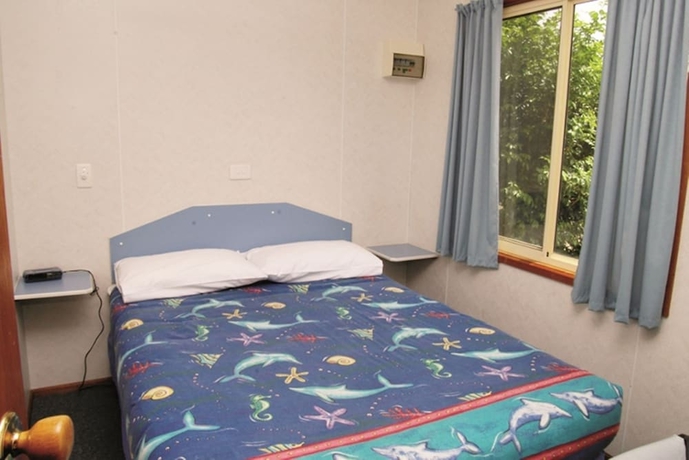 Imagen de la habitación del Hotel Smugglers Cove Holiday Village. Foto 19